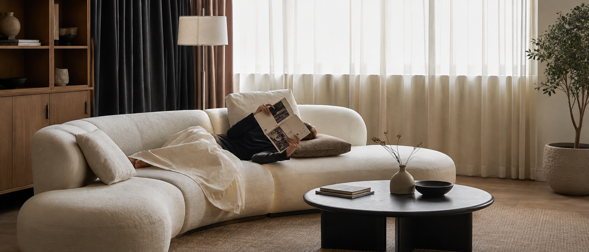 Soft textiles arranged in a relaxed home interior